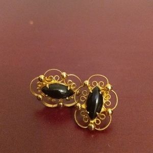 Black stone, filigree, studs